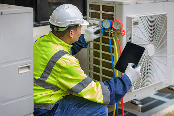 Professional Air Conditioning Repair technician working in Chester, VA